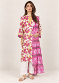 A woman modeling a long white kurta with a vibrant pink and yellow floral print on one side and a solid pink patterned drape on the other, paired with white pants and beige sandals against a light beige studio background.