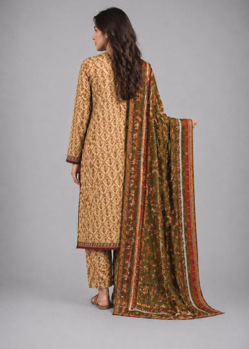 A woman shown from the back wearing a traditional patterned beige kurta with matching pants and a long olive green dupatta featuring red and gold borders, set against a plain gray studio background.
