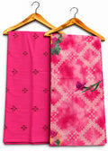 A pair of folded pink fabric garments or dupattas hanging on wooden hangers against a white background. The left piece is solid bright pink with small embroidered motifs, and the right piece is a pink and white patterned fabric with a floral print.