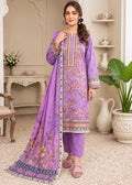 A woman models a traditional three-piece salwar kameez suit in lavender purple, featuring floral embroidery, a matching printed dupatta, and solid purple trousers, set against an elegant beige interior background.