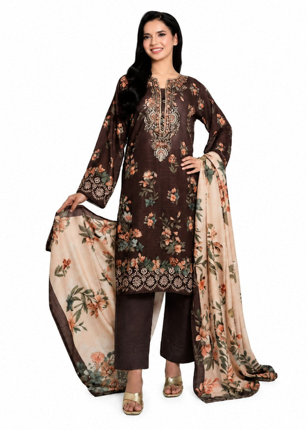 A woman modeling a traditional Indian salwar kameez suit set. The set features a dark brown long-sleeve tunic with intricate floral embroidery and a matching floral dupatta in beige, paired with dark brown trousers.