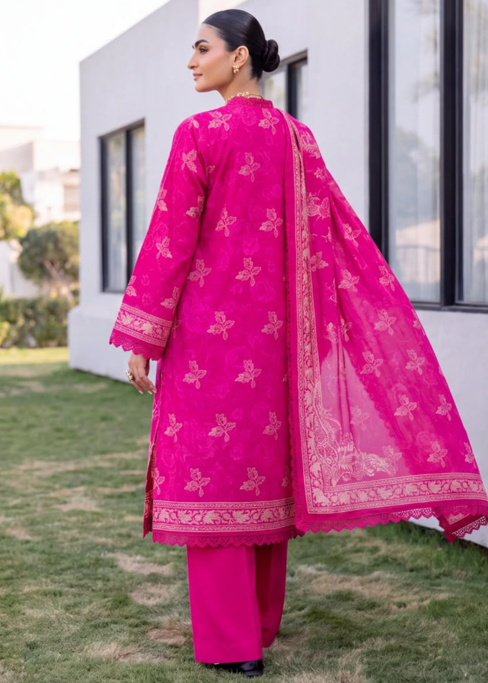 A woman modeling a bright pink traditional outfit with matching dupatta and trousers, shown in a split outdoor portrait layout. The outfit has subtle floral motifs and gold border detailing.