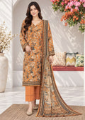 A woman models a traditional Indian salwar kameez suit set. The set features a mustard yellow-orange printed kurta with floral motifs, matching orange trousers, and a beige dupatta with a detailed black and gold border.