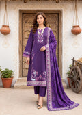 A woman models a traditional purple Indian salwar kameez suit with floral embroidery, matching trousers, and a long dupatta, standing in front of a rustic wooden door.