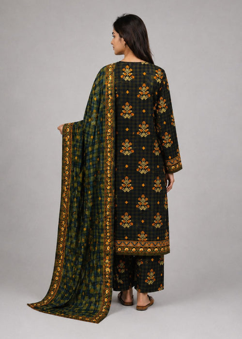 A woman shown from the back wearing a dark green and black traditional outfit with gold floral patterns and holding a matching patterned dupatta, against a neutral gray studio background.
