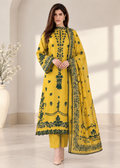 A woman models a three-piece traditional outfit consisting of a yellow kurta with dark green floral embroidery, matching yellow trousers, and a coordinating dupatta, set against a neutral indoor background.