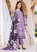 A woman models a three-piece lavender purple floral salwar kameez suit with matching trousers and a dupatta, set against an elegant classical stone archway background.