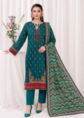 A woman models a traditional Indian salwar kameez suit set. The set features a teal green kurta with gold and red printed motifs, matching teal pants, and a patterned dupatta with green, gold, and red chevron designs.