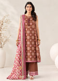 A woman models a traditional brown salwar kameez suit with intricate white and pink floral patterns, paired with a matching pink and gold patterned dupatta, set against a neutral studio background.